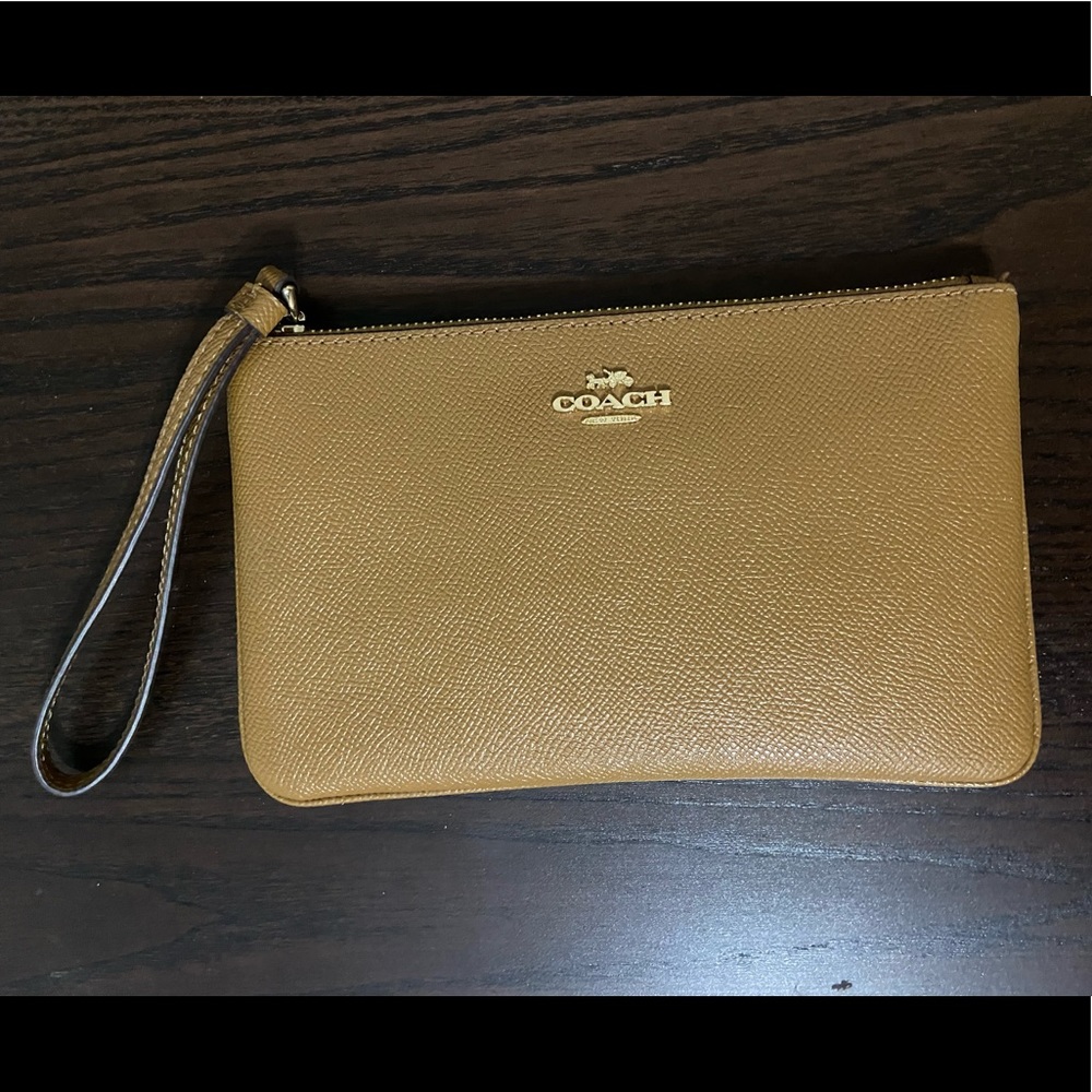 Tan coach wristlet wallet
